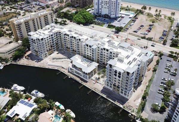 This bird’s eye view above the Broadstone Oceanside complex clearly illustrates the proximity of seawater on both sides of the development in Florida
