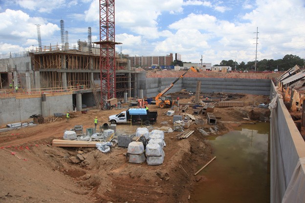 The below-grade concrete structure needed protection from the groundwater at the site. PENETRON-enhanced shotcrete was sprayed on the below-grade foundation walls.