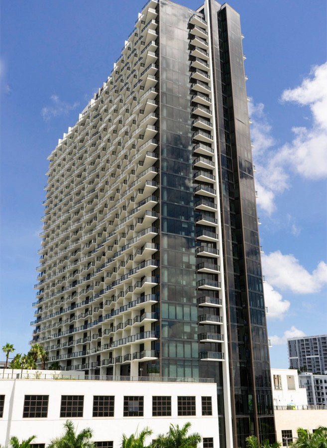 Gio Midtown, a mixed-use development, features a 39-story tower with 447 apartments, a parking garage, and retail and commercial office space.