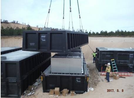 The first of three pre-cast concrete tanks for Sand Valley’s on-site wastewater treatment plant is set in place.