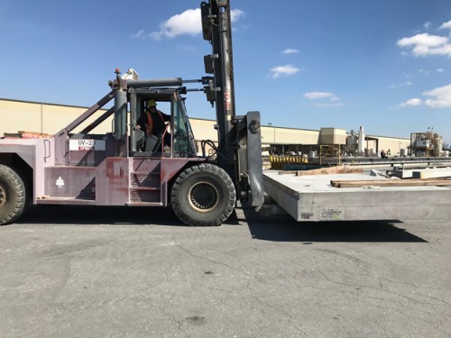 One of the pre-cast covers – waterproofed with PENETRON ADMIX – for the Santa Monica Urban Runoff Recycling Facility (SMURRF) is moved into place.